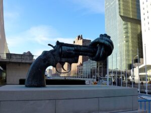 1280px-Non-Violence_sculpture_in_front_of_UN_headquarters_NY